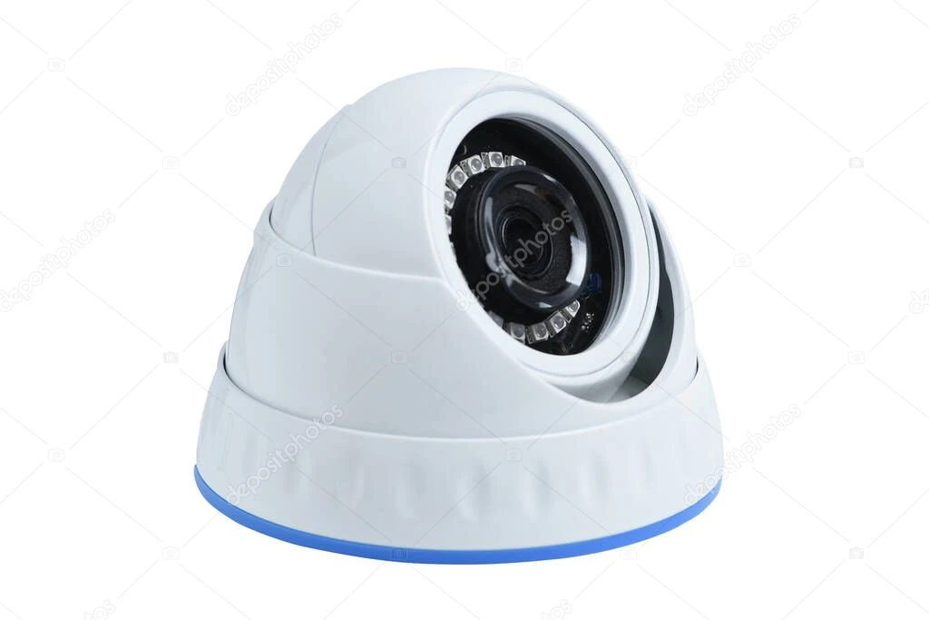 Close-up of a security camera overlooking a building entrance