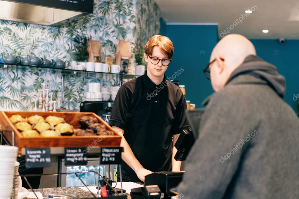 Retail EPOS terminals at a modern checkout counter